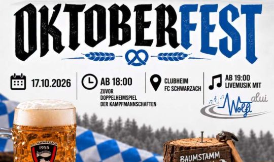 Ein Bierkrug und Brezeln auf einem Tisch Ein Bierkrug und Brezeln auf einem Tisch