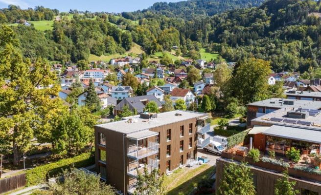 Urban-Apartmenthaus zwischen Berg und See Urban-Apartmenthaus zwischen Berg und See