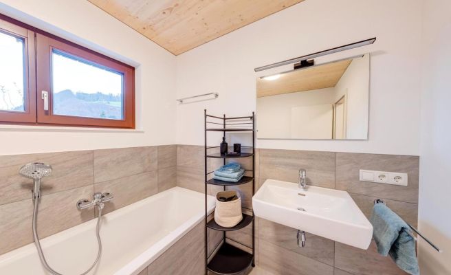 Urban-Apartmenthaus zwischen Berg und See Urban-Apartmenthaus zwischen Berg und See