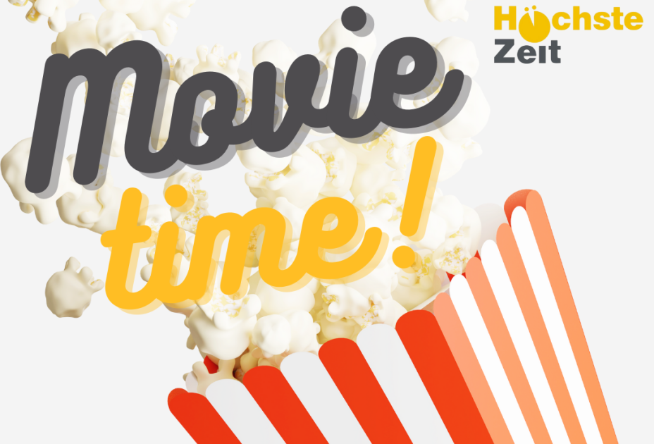 Popcorn in einem gestreiften Behälter Popcorn in einem gestreiften Behälter