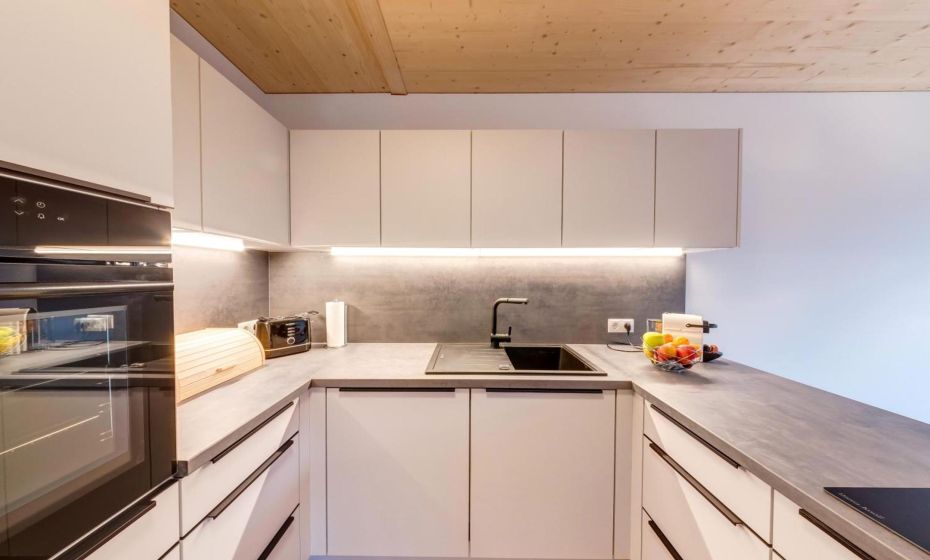 Urban-Apartmenthaus zwischen Berg und See Urban-Apartmenthaus zwischen Berg und See