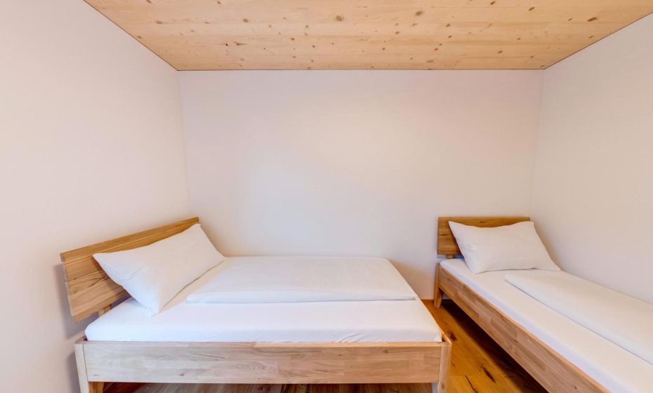 Urban-Apartmenthaus zwischen Berg und See Urban-Apartmenthaus zwischen Berg und See