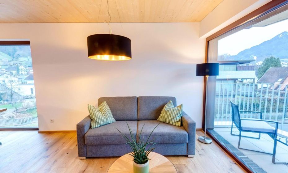 Urban-Apartmenthaus zwischen Berg und See Urban-Apartmenthaus zwischen Berg und See